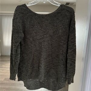 Dark green sweater. Worn a good amount of times.